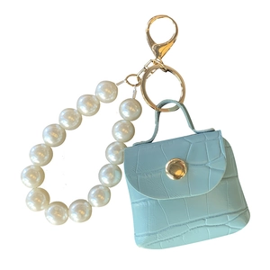 Mini light blue crocodile pattern PU leather bag keychain with white pearl strap and gold hardware