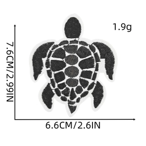 Detailed view of turtle embroidery patch with precise dimensions 7.6cm by 6.6cm
