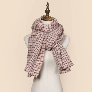 Elegant pink houndstooth plaid scarf with tassels, thick wrap style on a mannequin