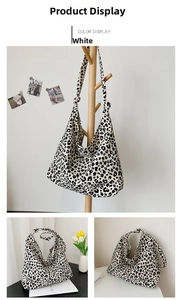 Dettaglio borsa hobo leopardata capiente con tracolla a nodo e trama in tela canvas