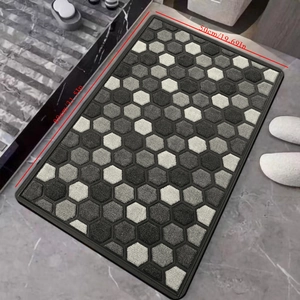 Detail view of 50x80cm absorbent bath mat with modern gray hexagonal honeycomb pattern