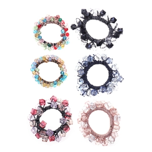 Set of six colorful pearl and crystal bead elastic hair ties in a clean grid layout