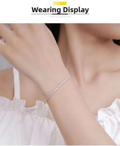 Close-up of elegant S925 sterling silver tennis bracelet with 2mm moissanite on wrist