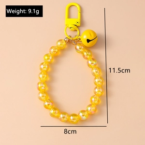 Detail view of yellow beaded keychain with measurements showing 11.5cm length and 9.1g weight