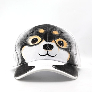 Detailed view of white baseball cap featuring artistic hand-painted animal face print