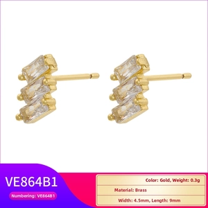 Detail view of 18K gold plated brass stud earrings with three tiered rectangular zircons