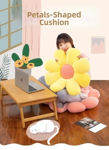 Macro shot of 3D daisy-shaped seat cushion in plush pink and yellow soft fabric