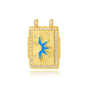 Macro detail of gold vintage rectangular star pendant with blue enamel and CZ crystals