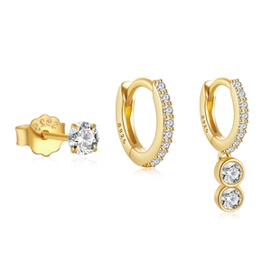 Detailed view of three-piece gold S925 silver earring set with sparkling white zircons