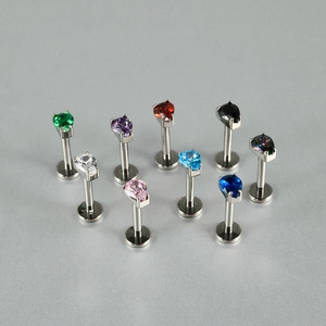 Flat back titanium labret studs featuring teardrop zircon stones in nine assorted colors