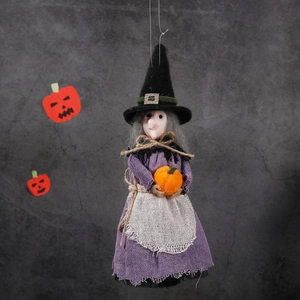 Halloween witch hanging decoration with purple dress, black hat, and orange pumpkin detail