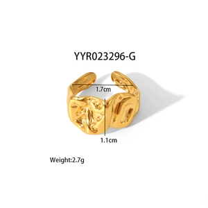 Detail shot of irregular gold textured ring showing dimensions 1.7cm and 1.1cm