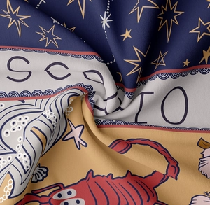 Macro detail of Scorpio tapestry fabric showing fine weaving texture and printed graphics