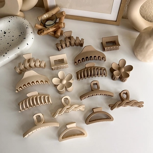 Elegant neutral matte hair claws set in cream, mocha and khaki minimalist tones
