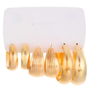 Three pairs of golden geometric hoop earrings with smooth and ribbed textures set