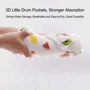 Absorbent multi-layer cotton gauze baby towel with green avocado print and 3D texture