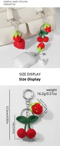 Detailed size chart of handmade crochet strawberry and cherry keychain charm showing dimensions
