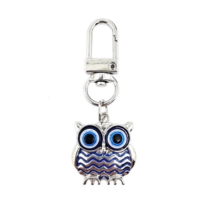Original owl alloy keychain with blue evil eye charms for bags and backpack decor