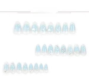 Blue gradient press-on nails set with 3D heart, star, and pearl embellishments