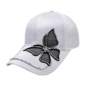 White satin baseball cap with butterfly rhinestone decoration and curved brim for women
