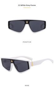 Detail view of white oversized sunglasses featuring a stylish gold star bridge accent