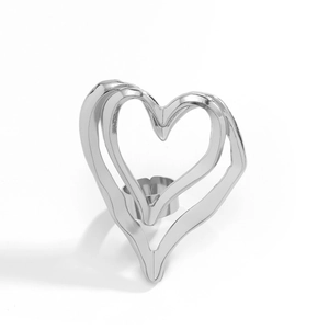 Detail of silver double layered hollow heart ring with 3D minimalist metallic texture