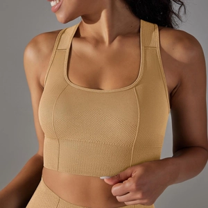 Detail of khaki seamless sports bra with honeycomb breathable texture and racerback design