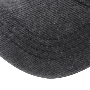 Macro view of parallel stitching details on a washed gray distressed baseball cap brim