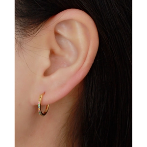 S925 sterling silver gold-plated hoop earring with colorful rainbow gemstones on ear