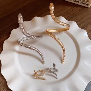Exaggerated snake-shaped bracelet and ring jewelry set in gold and silver plating