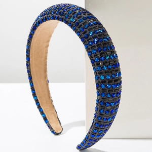 Serre-tête rembourré avec strass étoiles bleues et pierres noires sur socle blanc