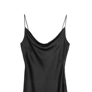 Elegant black satin slip dress with delicate lace trim detail against a white background