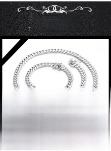 Detail view of 8mm stainless steel Cuban link chain necklace and bracelet set for men