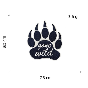 Detail of bear paw embroidery patch with gone wild text showing 8.5x7.5 cm dimensions
