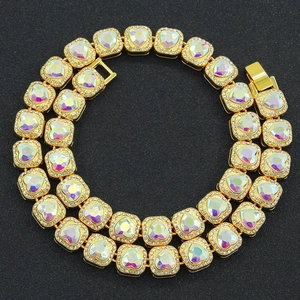 Men's gold-plated Cuban chain necklace featuring heart-shaped red rhinestones and small crystals