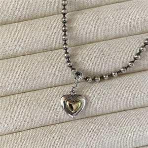 S925 sterling silver beaded chain necklace with nested silver and gold heart pendant