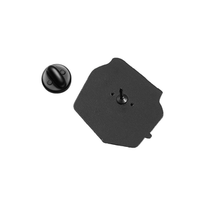 Detail of black metal badge backings and rubber clutches for enamel pin set