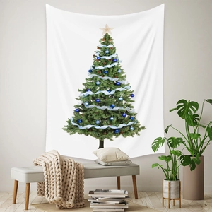 Detail of bohemian Christmas tree tapestry hanging on a white wall in modern living room
