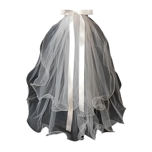 Short double-layered white bridal veil with satin bow and pearl accents for wedding