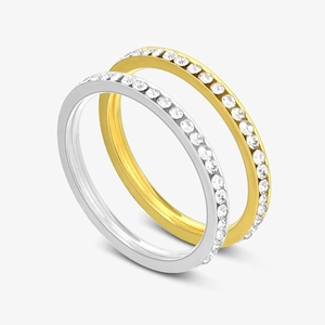 Close-up of 2mm silver and gold titanium steel rings with pavé cubic zirconia