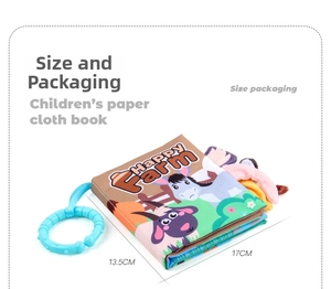 Detailed view of Happy Farm baby cloth book measuring 17cm by 13.5cm with blue hanging ring