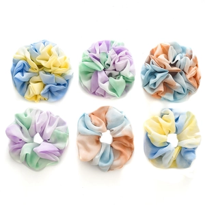 Set of six colorful tie-dye chiffon scrunchies in various soft gradient pastel colors