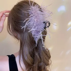 Elegant purple feather hair claw clip with sparkling rhinestone tassels for women