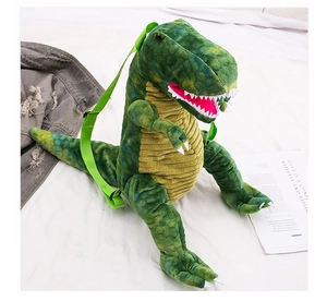 Detail view of the green dinosaur plush backpack with adjustable straps and soft texture