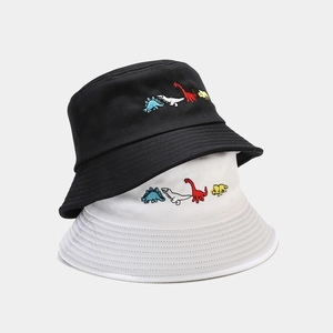 Black and white foldable cotton bucket hats featuring cute colorful dinosaur embroidery