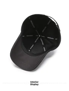 Interior view of black baseball cap showing reinforced seams and narason brand tape