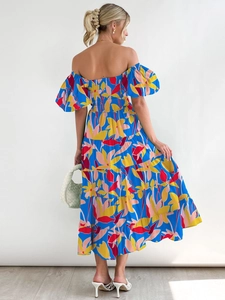 Back view of a blue floral tiered maxi dress with off-shoulder puffy sleeves