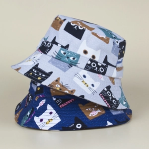 Folded canvas bucket hats with cartoon cat print in light grey and dark blue colors