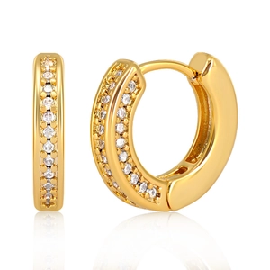Detail view of gold hoops with double-row micro-pave cubic zirconia stones on white base