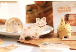 Gros plan détaillé d'autocollants de chats avec dorure pour le scrapbooking et l'agenda